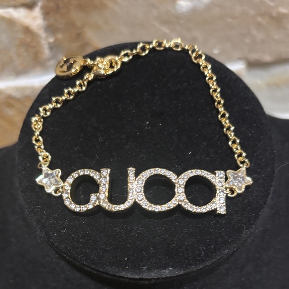 Gucci Gold Logo Bracelet with Star Accents - Picture 1 of 4